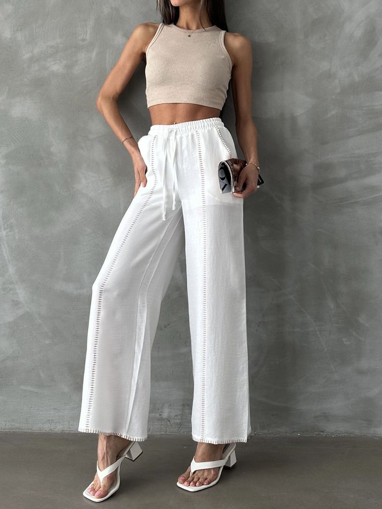 Spodnie lniane z haftem - biale