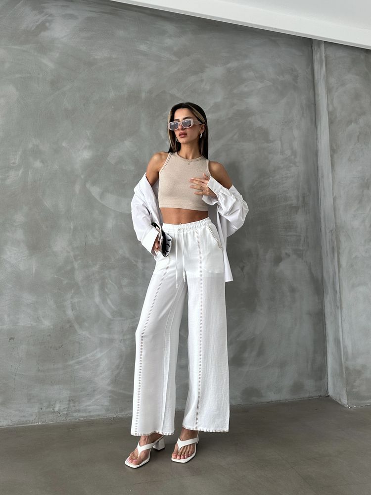 Spodnie lniane z haftem - białe