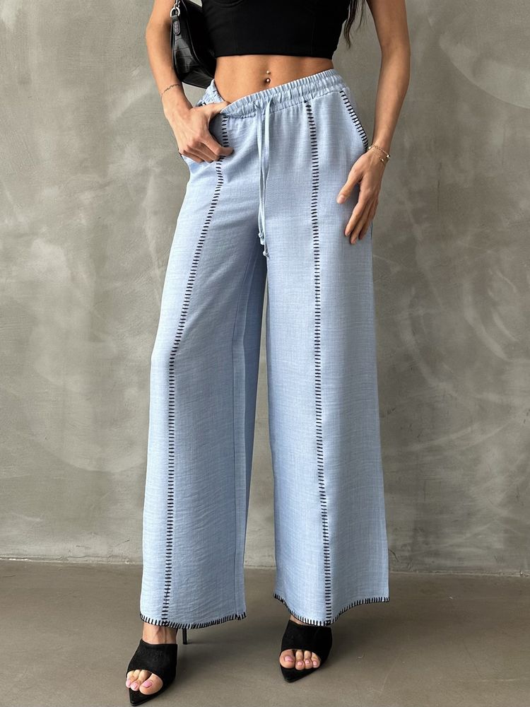 Spodnie lniane z haftem - jasny niebieski